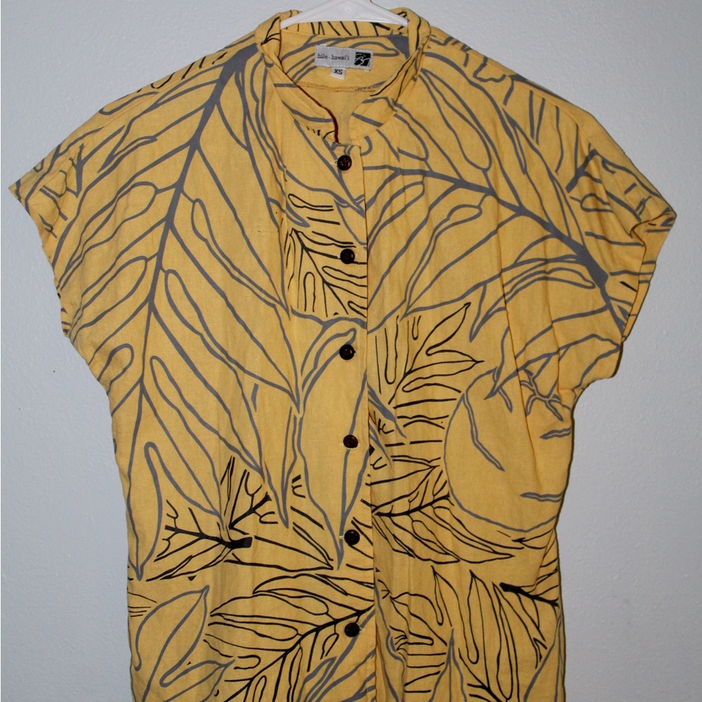 A button up yellow sig zane shirt